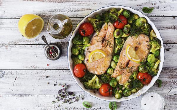 Salmon on a bed of vegatables, a great source of B Vitamins.